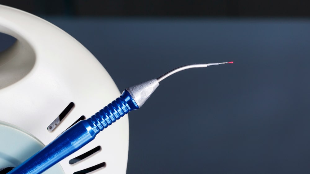 Dental laser and special tip for surgical procedures